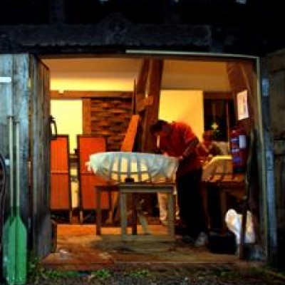 man working in shed