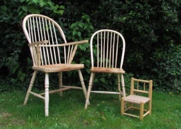 three wooden chairs 