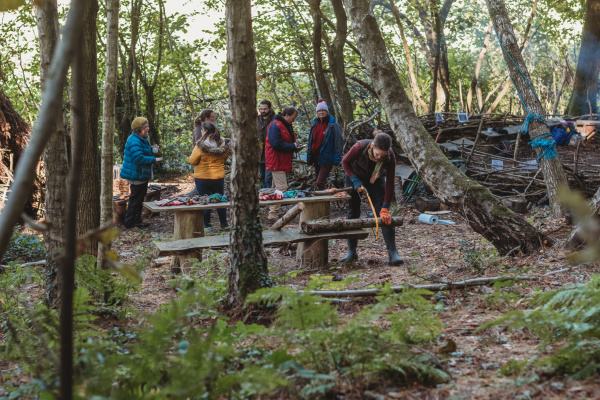 A group of people in a woodland