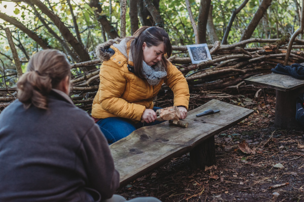 Person undertaking a woodland craft 